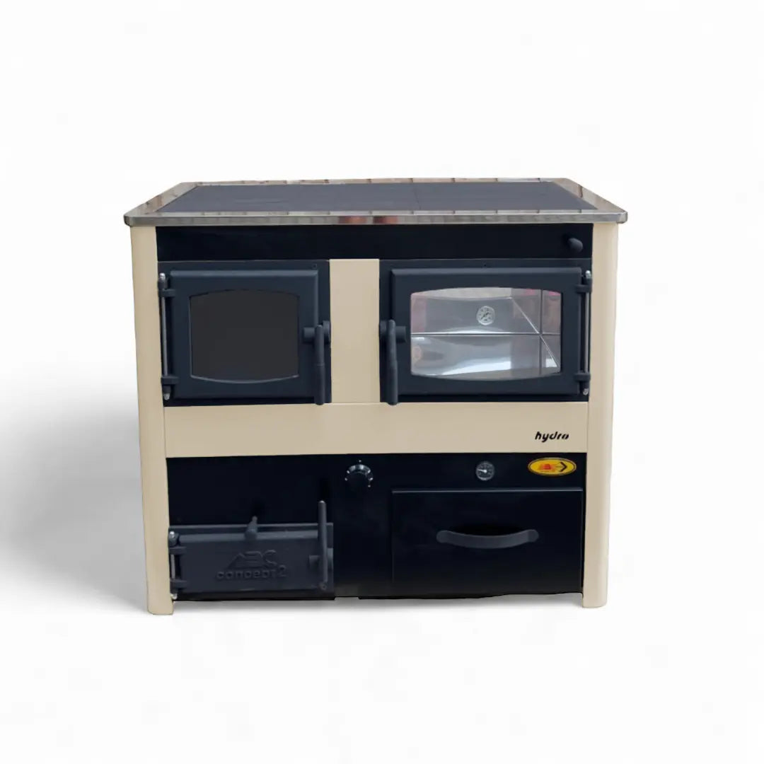 A compact dual-burner wood stove with a beige and black color scheme, featuring two front doors, a top metal grate surface, and a lower drawer, shown against a plain white background.
