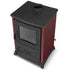 A red and black wood-burning stove with a glass front door and a circular chimney breast cutout on the top, shown on a white background.