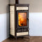 A freestanding wood-burning stove with a dark brown frame and cream-colored decorative panels, featuring a glass door showing a bright fire inside, set against a two-tone wall and wood floor.